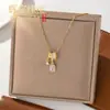 Colar de borla de diamante com esmalte de gota de luxo leve estilo francês microincrustado para mulheres, corrente de clavícula doce de dopamina da moda de alta qualidade