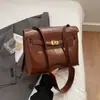 Bolso de Hombro para Viajes de Negocios de Gran Capacidad con Textura Retro para Mujer 2025 Nuevo Maletín Sencillo Bolso Versátil de Hombro Platino
