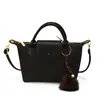 Nova bolsa de ombro trançada simples e estilosa para o dia a dia de outono, bolsa tipo balde da moda, bolsa transversal feminina estilo coreano