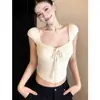 Top de punto versátil y puramente sexy, ajuste ceñido, sin mangas para mujer, top tipo camisola corto con lazada estilo francés