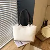 Bolso Tote simple estilo nuevo versátil otoño bolsa de gran capacidad para mujeres 2026 bolso de hombro para ir al trabajo moderno casual
