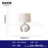 Lámpara de escritorio simple posmoderna para dormitorio principal, lujo ligero, modelo de diseñador nórdico, sala de estar, dormitorio, mesita de noche, lámpara decorativa creativa