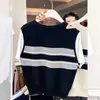 Conjunto de verano estilo coreano: Camiseta de manga corta de dos piezas falsas a rayas de albaricoque para mujer, top holgado super popular 2026 que reduce la edad