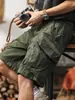 Bermudas de trabalho funcionais para homem, estilo fino de verão, marca da moda, corte solto, novo modelo 2026, calças casuais de comprimento médio para homem