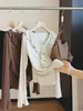 Camiseta de manga larga con lunares y volantes estilo francés para mujer, colección de otoño, entallada en la cintura, corte ajustado, top elegante, chic y hermoso