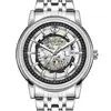 Explosiones de comercio exterior moda de negocios tendencia hombres reloj de doble cara hueco calendario correa de acero reloj de cuarzo una generación de pelo