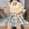 2024 nueva colección japonesa uniforme JK falda a cuadros traje de manga corta para mujer falda plisada uniforme escolar jk para estudiante venta al por mayor generación