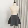 Falda corta de punto de lana gris oscuro para mujeres petite, Nueva falda abullonada de línea A de cintura alta Otoño e Invierno 2025