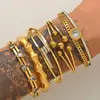 Pulsera estilo transfronterizo europeo y americano con diseño de lazo, serpiente y árbol de la vida, completamente incrustada con diamantes, una pieza moderna y única para mujeres, disponible al por mayor