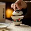 Colección de Teteras de Cerámica Pintadas a Mano Estilo Antiguo con Esmalte Caramelo, Diseños Azul Índigo y Melocotón Rojo para Uso Doméstico, Incluyendo Tetera, Gaiwan, Taza de Maestro y Taza de Té