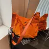 Bolso Bandolera de Lona de Gran Capacidad Transfronterizo para Mujer 2026 Nuevo Bolso de Hombro Versátil de Nicho con un Toque de Alta Gama para Viajar Bolso Dumpling