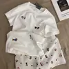 Pijama redondo de nuevo estilo transfronterizo para mujer, con un lindo estampado de salchicha, adecuado para usar en verano y se puede usar como ropa casual para estar en casa.