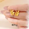 Pendientes de flor chapados en oro al por mayor, pendientes largos de borla de perla dorada de lujo ligero de alta gama para mujer, alta retención de color, pendientes de Año Nuevo