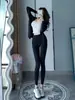 Conjunto de yoga ajustado para mujer, cuello alto, chaqueta de manga larga con cremallera, pantalones de tiburón de cintura alta, conjunto de dos piezas para correr y fitness