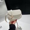 Bolso de Silla de Montar Retro Coreano 2025 Verano Nuevo Bolso Bandolera de un Solo Hombro Moda Simple Literario Señoras Bolso de Concha Dura