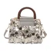 Bolso cruzado de un solo hombro moderno y elegante con textura simple, nuevo bolso pequeño cuadrado de moda para mujer Primavera 2026