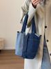Bolso Cubo de Mezclilla Lavada de Nicho para Mujer 2026 Nueva Moda Bolso de Mano Versátil Estilo Commuter Bolso Cruzado