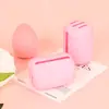 Caja de almacenamiento de esponjas de maquillaje portátil más vendida transfronteriza, diseño cilíndrico, transpirable y a prueba de polvo, funda protectora de silicona