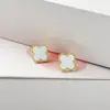Pendientes de botón grandes de trébol de cuatro hojas diseño de nicho sentido del diseño Corea del Sur versátil alta calidad lujo ligero elegantes simples dulces pendientes