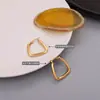 MARKA Pendientes geométricos en forma de U exagerados de estilo francés europeo y americano pendientes simples retro a la moda acero de titanio oro de 18 quilates F473