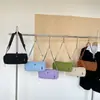 2026 Bolso Cilíndrico Nuevo Bolso de Mano para Mujer Bolso de Hombro Único Bolso Cruzado para Teléfono Bolso Pequeño Color Sólido Textura Popular Bolso Pequeño