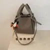 Bolsas de Moda de Diseño de Nicho para Madre e Hija de Este Año 2025 Nuevo Estilo Bolsos de Mujer Elegantes Versátiles Bolsos Cruzados Bolso de Mano Bolso Cubo