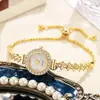 Reloj para mujer, moda nicho con incrustaciones de diamantes, redondo, totalmente de diamantes, pulsera de extracción para aprendizaje de mujer, reloj de cuarzo