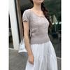 Camiseta de punto de seda helada calada de manga corta con lazo, nuevo estilo de verano, cuello redondo, corte ajustado, top corto petite, Fábrica