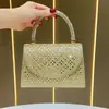 Nova bolsa de mão elegante e deslumbrante para mulheres, uma bolsa de noite chique com adornos de strass, uma bolsa tote versátil e uma bolsa de ombro única