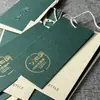 Etiqueta de diseño gratuito etiqueta de doradura de alta gama listado etiqueta de ropa de tienda de ropa para mujer Pedir logotipo ropa de hombre