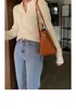 Top de Malha com Gola Polo e Mangas Longas