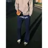 Pantalones de chándal elásticos de marca de moda transfronteriza para hombre, diseño de alta calle americana, pantalones largos casuales de corte slim, modernos y versátiles