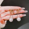 Pendientes largos de borla de perlas de lazo de aguja de plata S925 estilo japonés y coreano temperamento frío diseño de nicho pendientes pendientes