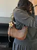 Bolsas de Mujer Transfronterizas 2026 Bolso de Mano de Nicho para el Trabajo Bolso de Hombro Underarm Retro Bolso Cruzado Pequeño Cuadrado Casual de Alta Gama