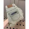 Shorts jeans de cintura alta estilo americano para mulheres, novo verão 2026, hot pants vintage justos e elásticos com design de linha A que abraça o quadril