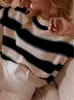 Exportación exclusiva transfronteriza de Amazon 2026, nueva ropa de mujer para otoño e invierno, suéter casual holgado a rayas vintage