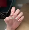 Las uñas cortas y portátiles más vendidas de Xiaohongshu: Puntas de Uñas Ojo de Gato con Lunares, Uñas Postizas Frescas y Lindas