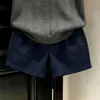 Ropa infantil estilo coreano 2026 nuevo modelo de verano: Polo de punto transpirable con bloques de color, diseño calado, de manga corta para niños y shorts azul marino