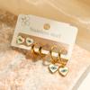 Aogu Europeos y Americanos Chapados en Oro de 18 Quilates Zirconia Goteo de Aceite Ojo del Diablo Acero de Titanio Pendientes para Mujer Set de Pendientes Elegantes de Nicho Nuevo