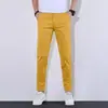 Pantalones casuales cropped de alta gama color azul cielo para hombre de Hong Kong, nuevos pantalones coloridos elásticos ajustados para otoño para hombre