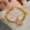 Nova Pulseira Borboleta Esmaltada Gotejada a Óleo Estilo Chinês, Estética de Alto Valor Nicho, Pulseira Envolvente com Fragmentos Irregulares de Ouro, Pulseira de Alto Valor