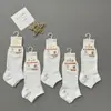 Calcetines Cortos de Algodón Peinado Estilo Nuevo para Mujer y Hombre, Calcetas Tipo Invisible, Color Sólido Negro y Blanco, Modelos Populares para Hombres y Mujeres, Adecuados para Puestos Callejeros y Mercados Nocturnos