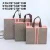 Suministro en stock prensado en caliente nuevo tienda de ropa publicidad centro comercial compras color recubierto bolsa de mano no tejida