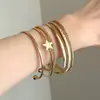 Pulsera Apilable de Múltiples Capas con Estrella Dorada Vintage Y2K Milenial Pulsera de Personalidad Hot Girl Diseño de Moda Accesorio Versátil para la Mano