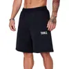 YOUNGLA Estilo Americano Esportivo Calça de Cinco Pontos Camuflagem Folhagem Masculina Casual Retrô Letras Solta Fitness Roupa de Praia