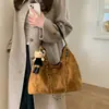 Bolso Vintage de Axila 2025 Nuevo Bolso de Hombro Acolchado de Cadena Versátil para Viajero Bolso Cruzado