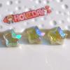 Accesorios acrílicos al por mayor accesorios DIY material hecho a mano hebilla de zapato pegamento crema adorno para la cabeza infantil brillo fino estrella de cinco puntas