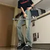 Vibras estilo americano, jeans de pierna curva para hombre, invierno, alta costura, corte limpio, azul retro, ligeramente acampanados, adelgazantes y forrados de felpa