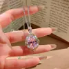 Pingente Dourado Bicolor de Artesanato Estilo Corte Italiano com Diamante Rosa Incrustado, Brincos Verde Oliva, Anel Azul Oceano e Conjunto de Pedras Preciosas