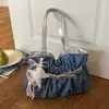 Bolsa de Ombro Única Versátil de Alta Qualidade para Viagem Transfronteiriça Verão 2026 Nova Exclusiva Moda Nicho Design Único de Ombro Sob o Braço Modelo Saco